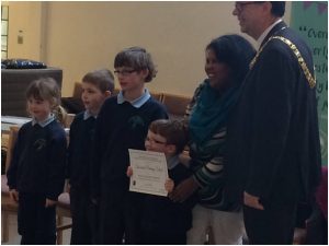  Donald Wilson, The Right Honourable Lord Provost of the City of Edinburgh, together with Pamela from our factory in Mauritius, presents Trossachs Primary School with their Award for embracing school uniform made with Fairtrade Cotton during a Fairtrade Fortnight ceremony at Methodist Hall. The initiative, inspired by the Edinburgh Fairtrade City Group, awarded certificates to nearly 20 Scottish schools who have embraced Koolskools uniform made with Fairtrade cotton.